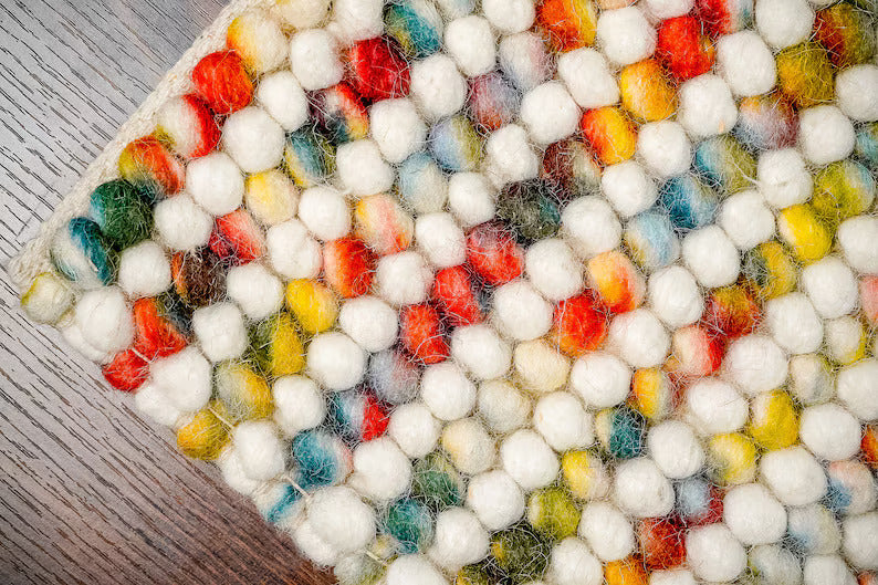 Handcrafted Multicolor Felted Wool Pebble Rug – Luxurious Artisan-Made Carpet with Soft Textured Surface in Vibrant Rainbow Tones for Modern or Bohemian Interiors