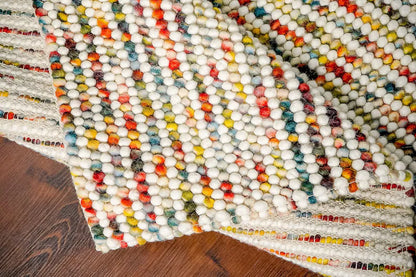 Handcrafted Multicolor Felted Wool Pebble Rug – Luxurious Artisan-Made Carpet with Soft Textured Surface in Vibrant Rainbow Tones for Modern or Bohemian Interiors