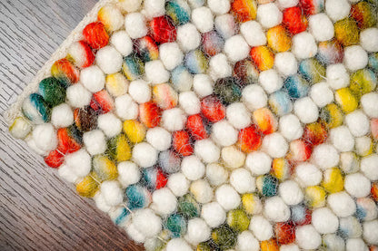 Handcrafted Multicolor Felted Wool Pebble Rug – Luxurious Artisan-Made Carpet with Soft Textured Surface in Vibrant Rainbow Tones for Modern or Bohemian Interiors