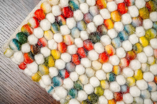 Handcrafted Multicolor Felted Wool Pebble Rug – Luxurious Artisan-Made Carpet with Soft Textured Surface in Vibrant Rainbow Tones for Modern or Bohemian Interiors