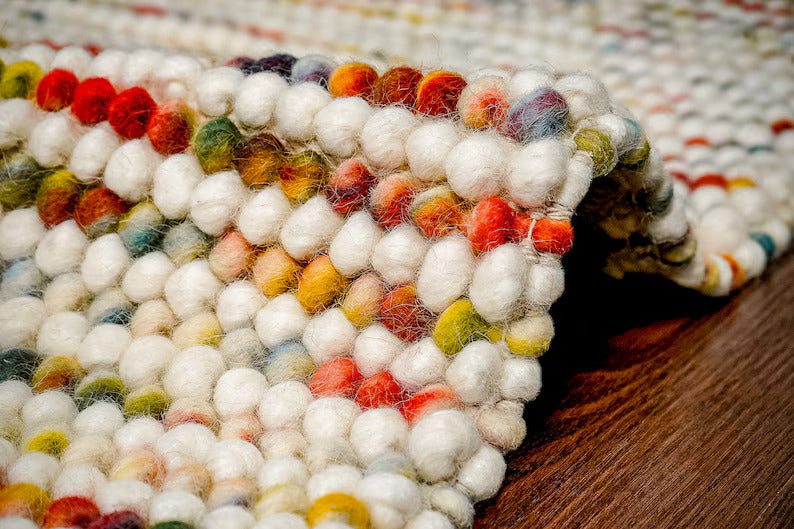 Handcrafted Multicolor Felted Wool Pebble Rug – Luxurious Artisan-Made Carpet with Soft Textured Surface in Vibrant Rainbow Tones for Modern or Bohemian Interiors